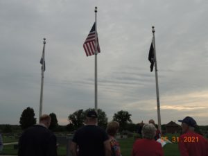 Flags waving above the 2021 Memorial Day Service